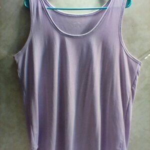It is a Justbe t-shirt 1xl in a really pretty lavender color